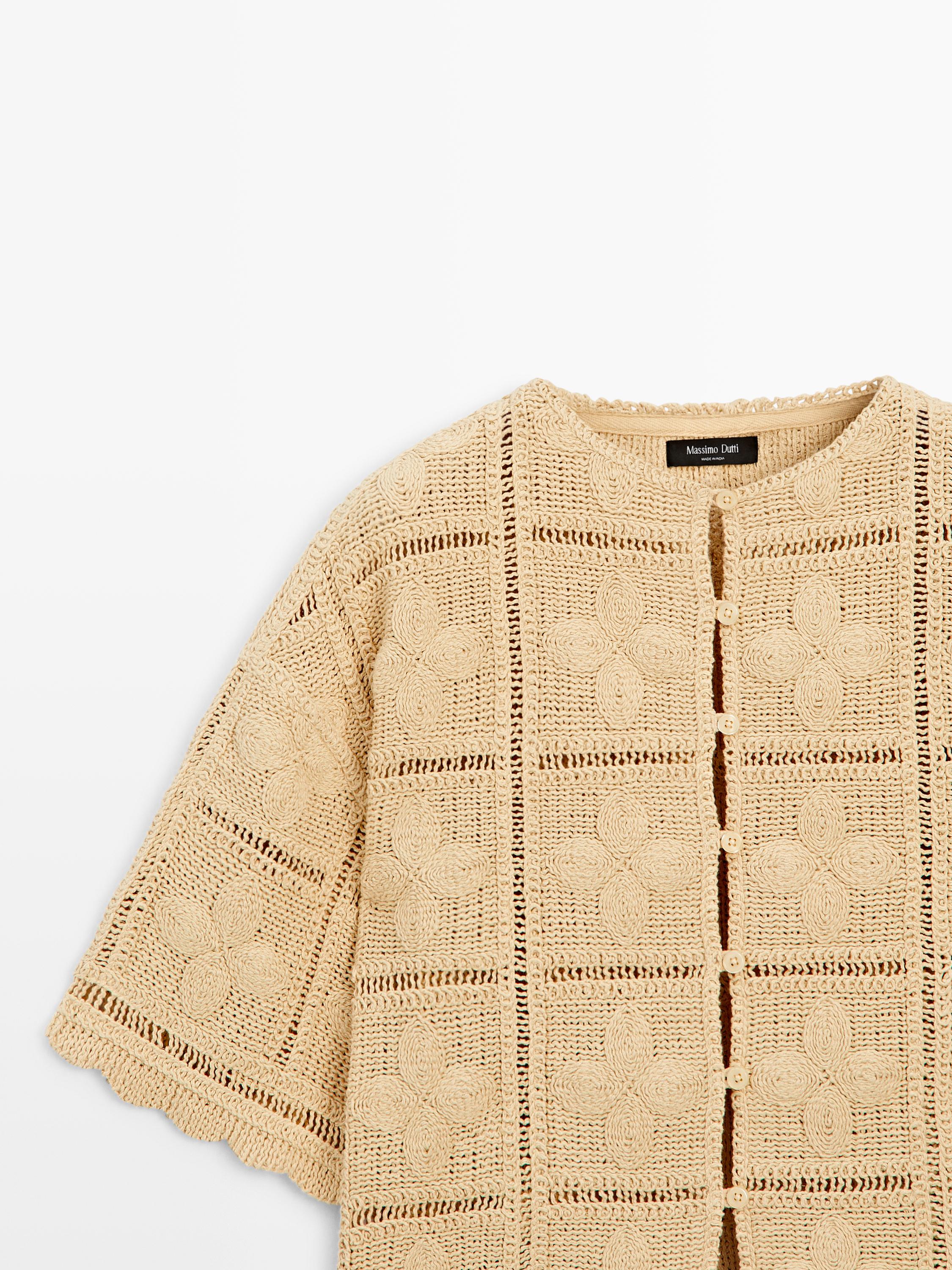 Veste en maille ajourée et crochet